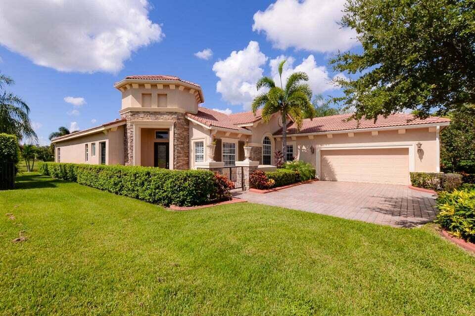 Stunning home in VERANO with spectacular lake views and unique courtyard entrance !