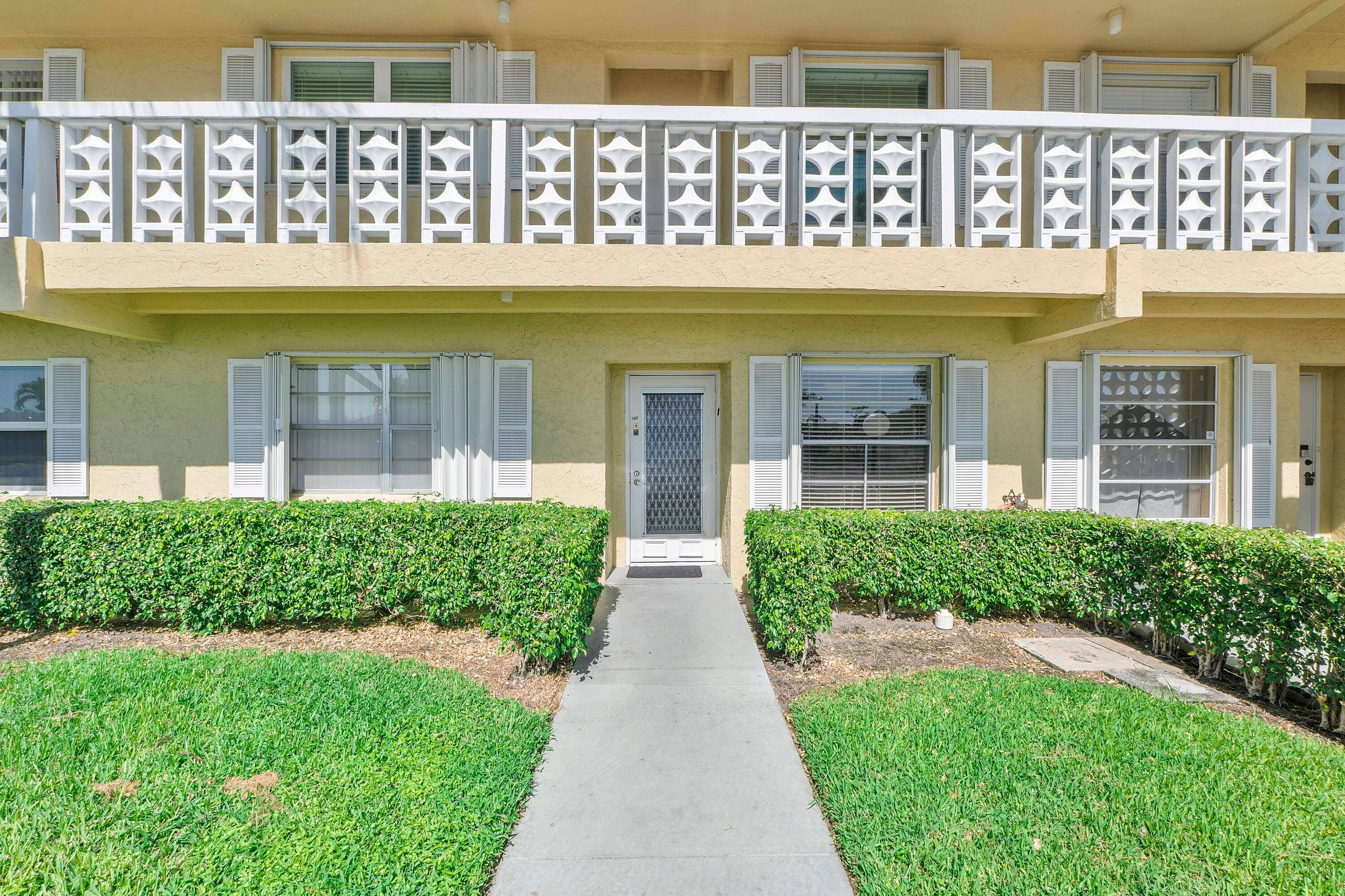 This is a sunny light first floor apt with a tiled floor porch off living room.
