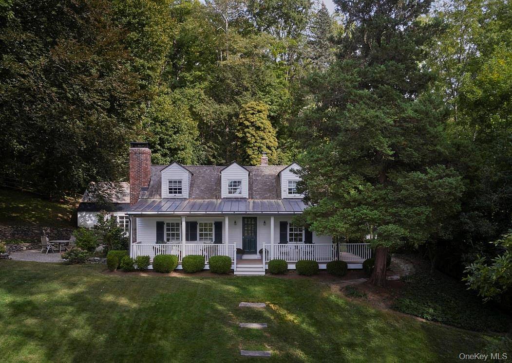Tucked away on 1. 5 acres along one of Dutchess County's most scenic roads, this 1950 s Millbrook cottage is the definition of charm and style.