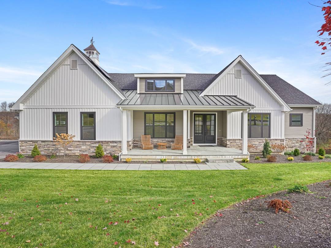 Set within the gates of Willow Creek Estates, Southbury's only gated private community, this Modern Farmhouse Ranch captures the rare balance of sophistication and serenity.