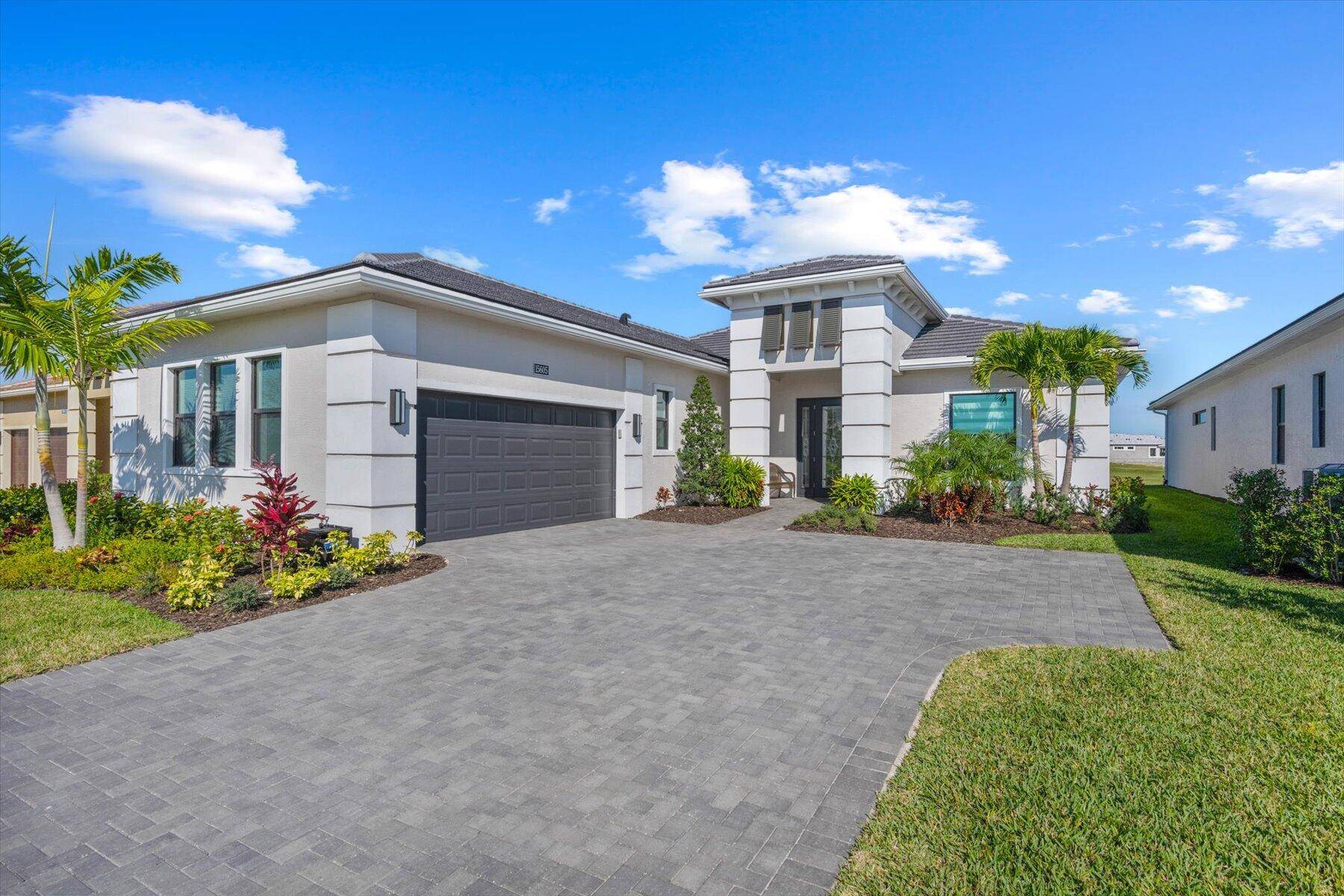Nestled in the highly sought after community of Cresswind Palm Beach, Westlake's only active adult community, this stunning Rosemary model offers an exquisite blend of luxury and functionality.