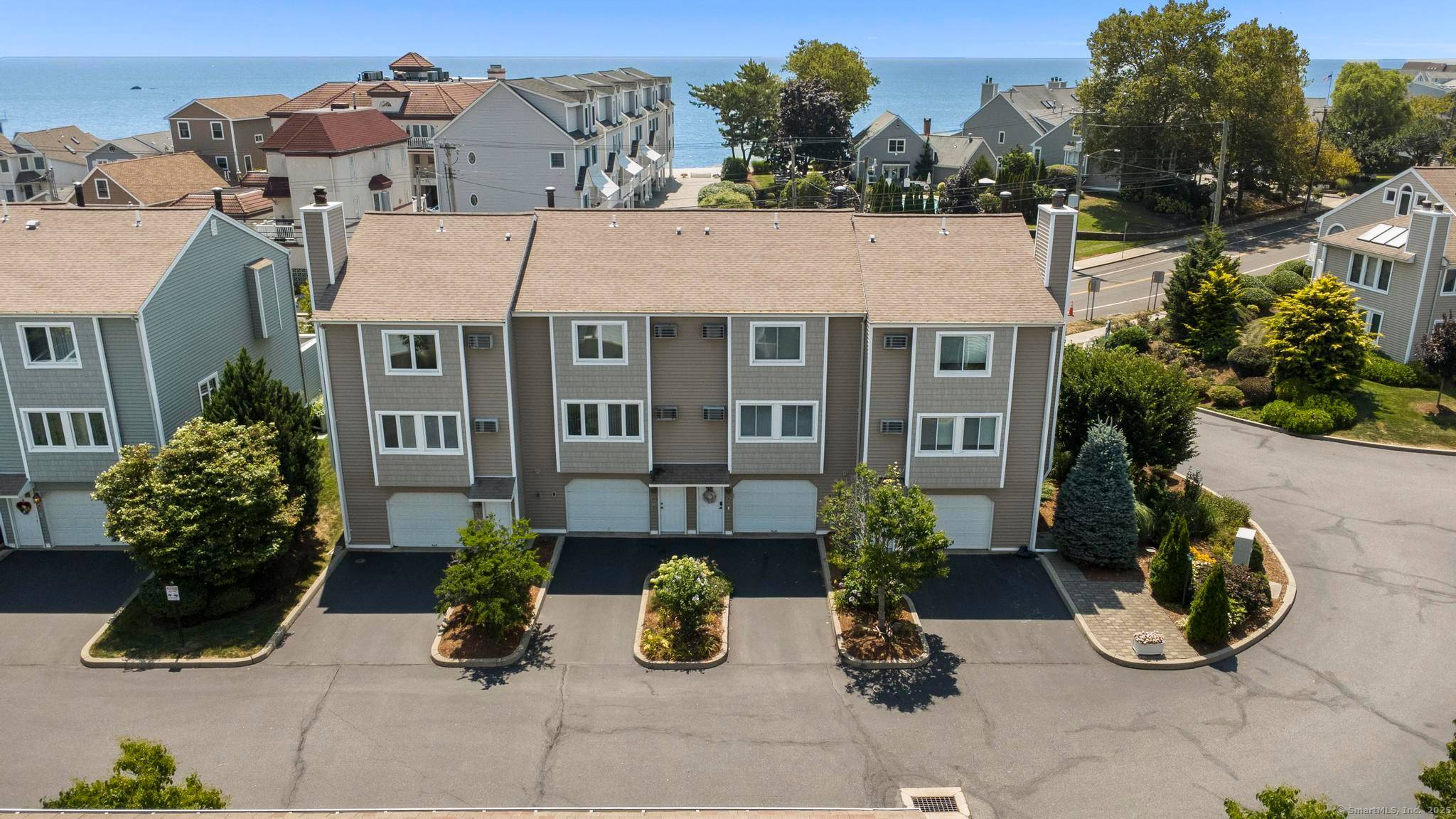 Welcome to 76 Merwin Avenue a completely renovated coastal townhome offering the ultimate blend of modern luxury and relaxed beachside living.