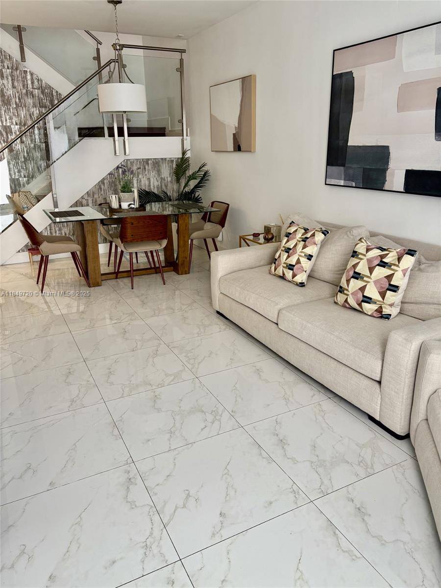 Make this your home, NEOVITA, a modern community in Doral, this 4 bedrooms and 3 full bath townhouse, one convenient bedroom with a full bathroom on the first floor.