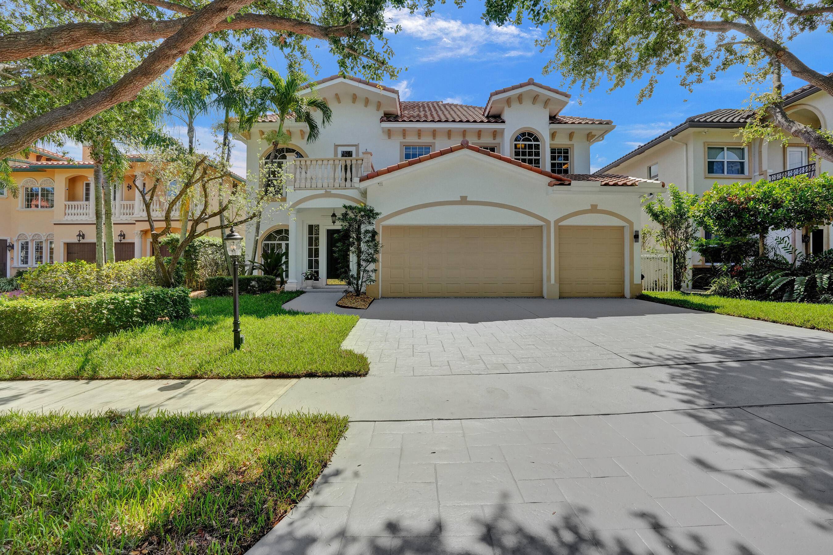 Discover the epitome of Delray living in this stunning Mediterranean masterpiece nestled within the coveted and gated community of Valencia Court.