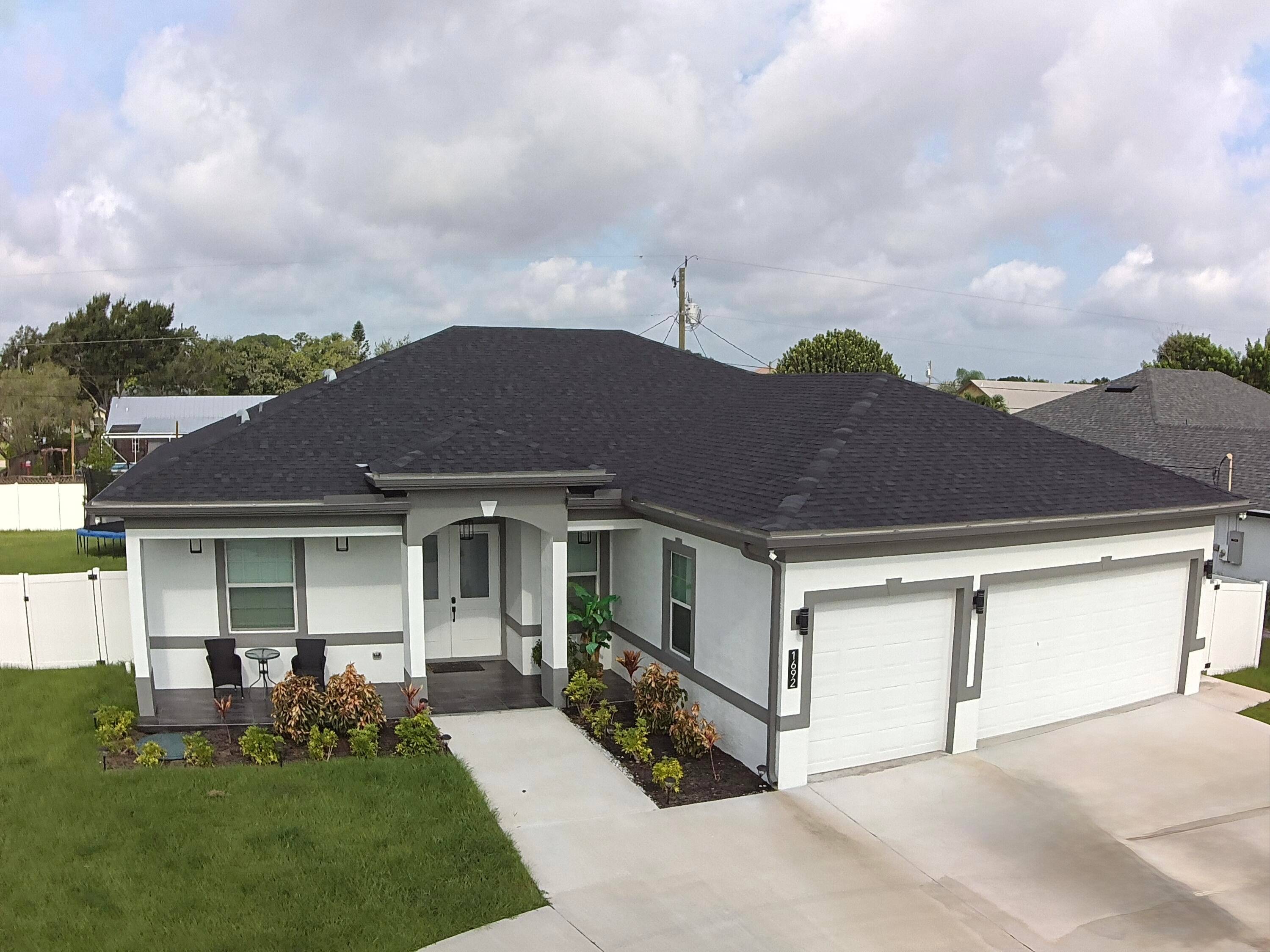 Welcome to Paradise ! NO HOA 2022 BUILTLocated between Tradition and PGA Verano, this modern 4 bedroom 2 1 2 bath House with a pool is in a quiet neighborhood ...