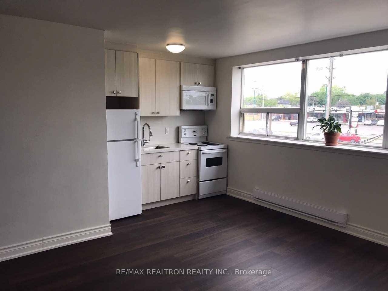Renovated Bachelor Apartment Above Store.