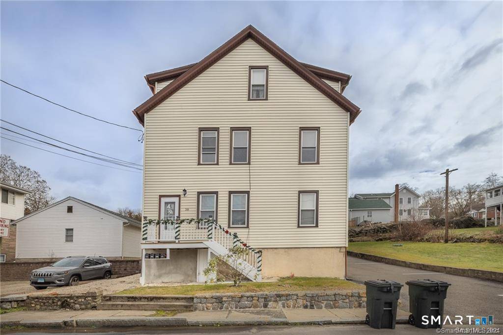 Meticulously maintained three family home in the highly sought after Hilltop section of Ansonia, offering the perfect blend of comfort, convenience, and investment potential.