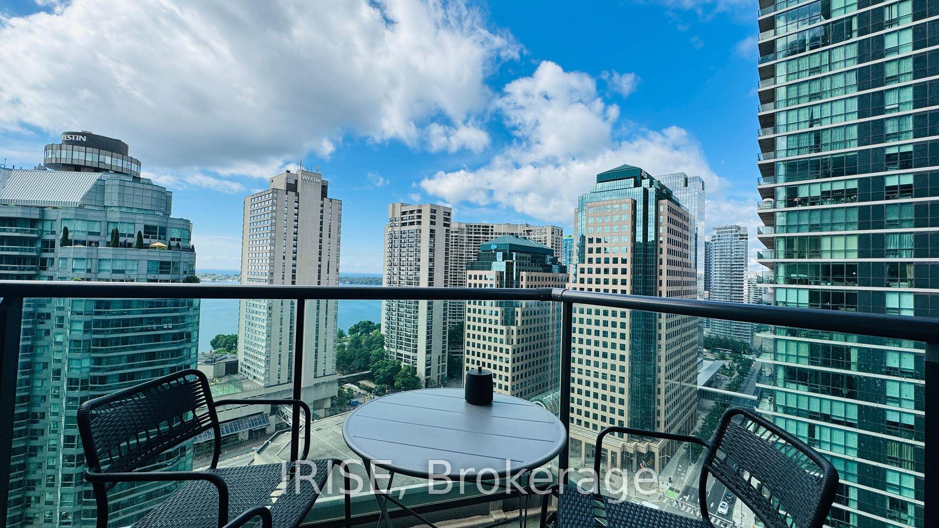 Welcome to this bright southwest corner suite at The Pinnacle Centre, perfectly situated between Yonge and Bay, just steps from Torontos waterfront, St.