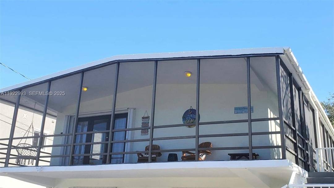 Solid Concrete Home Steps from Harry Harris Park !