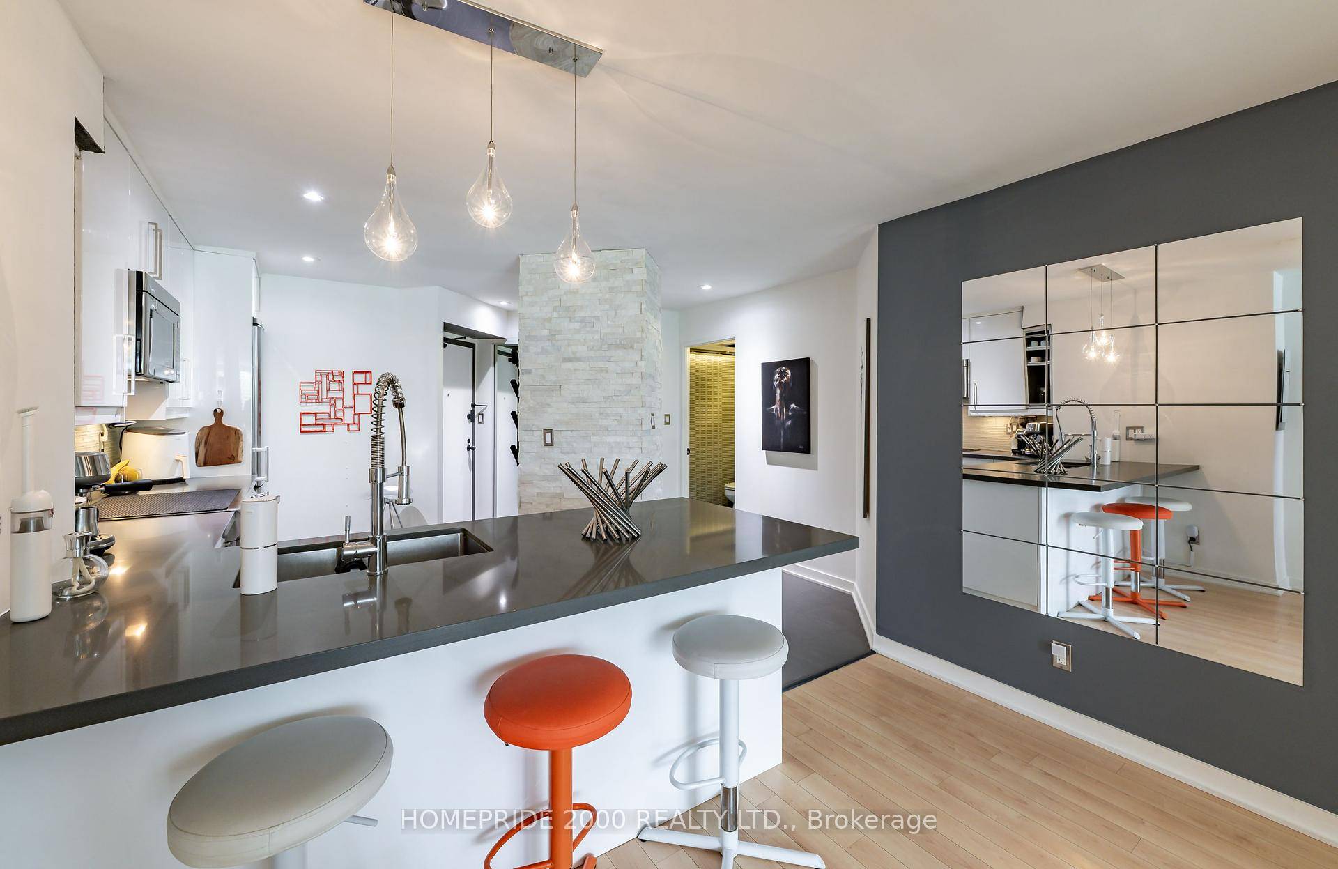 Don't Miss Out on This Spacious, Contemporary, Completely Renovated Unit with Rare South Facing Views to Green Space !