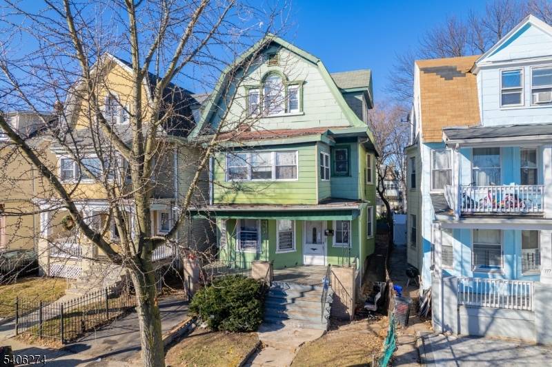 Single family home with an existing three Unit layout, offering strong potential for investors or buyers seeking a full renovation project.