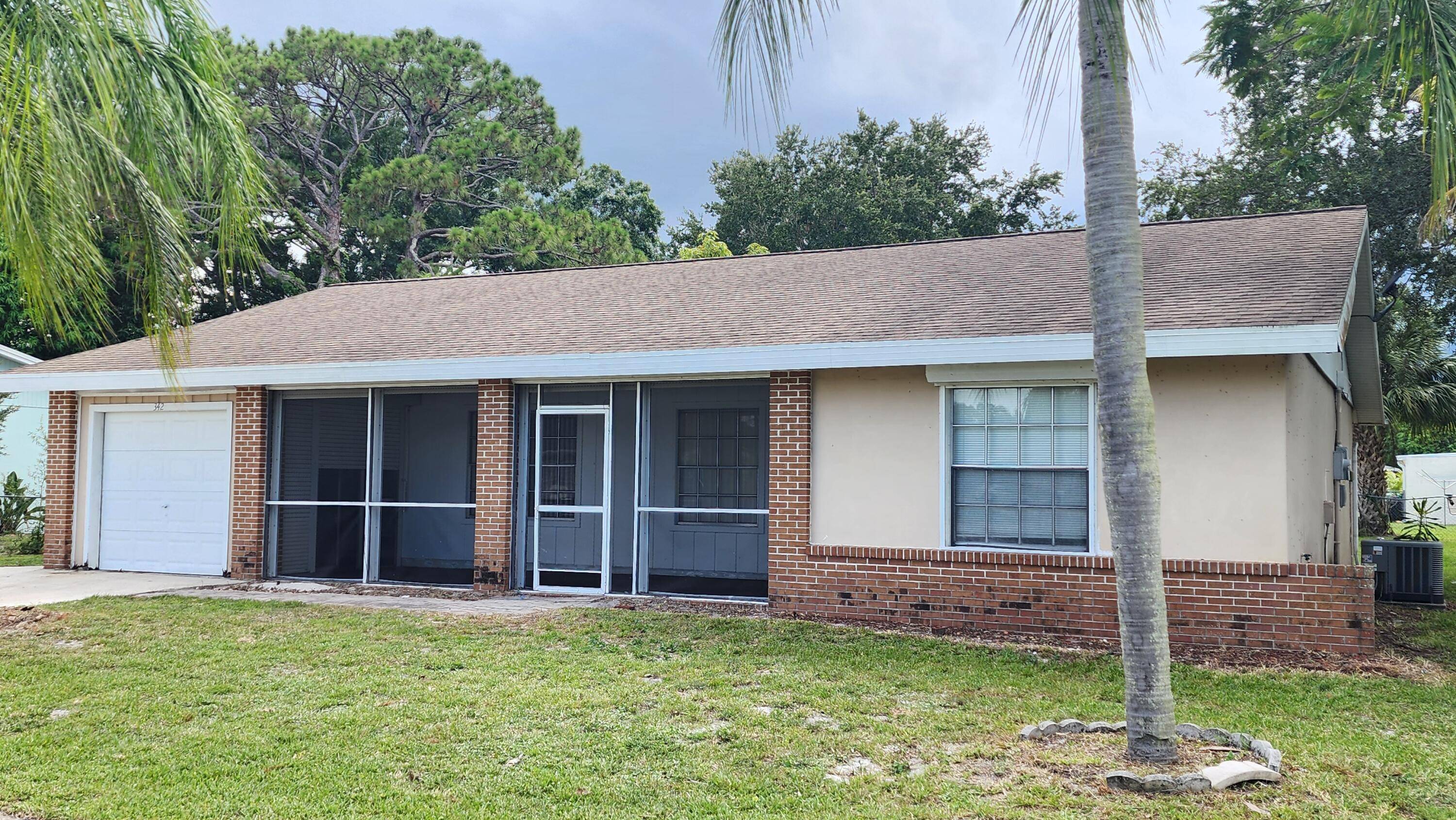This cozy 3 bedroom, 2 bathroom residence with a convenient storage space is perfect for comfortable living in central Port St.