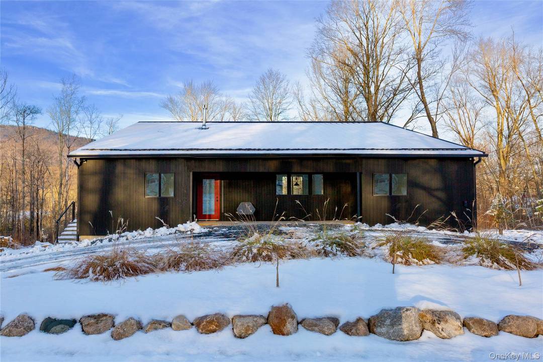Set just steps from Tillson Lake and framed by the quiet landscape at the base of the Shawangunk Mountains, this newly built contemporary home offers a rare combination of modern ...