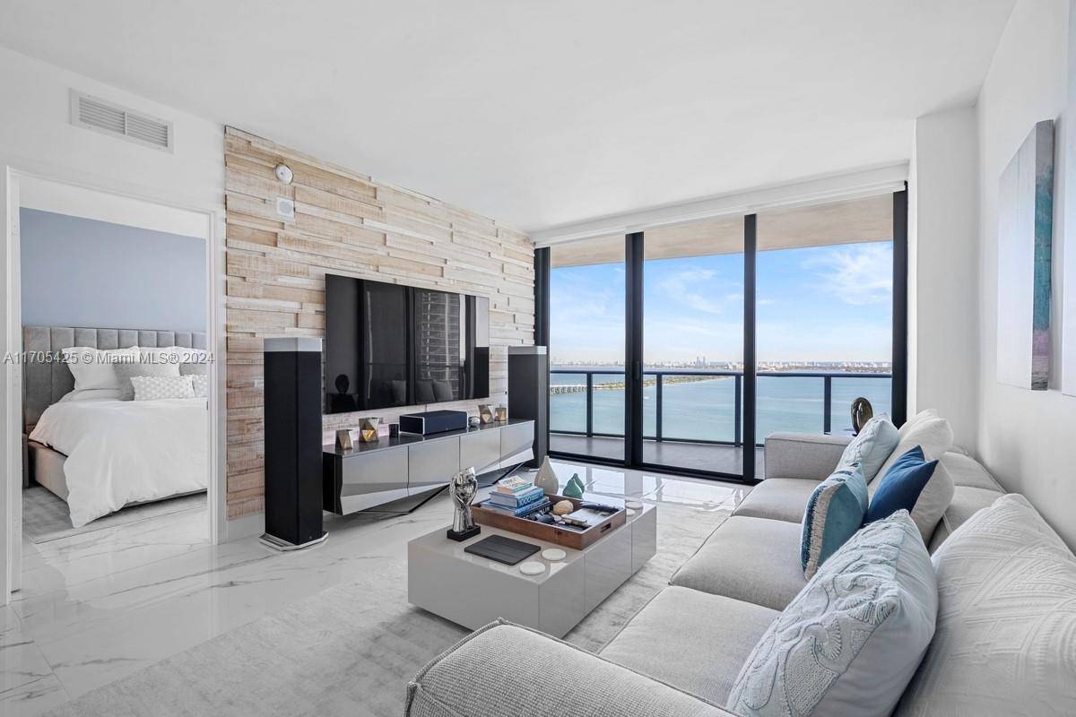 This stunning 2 bedroom condo at Icon Bay offers breathtaking, unobstructed bay views amp ; has been thoughtfully upgraded w modern, high end features.