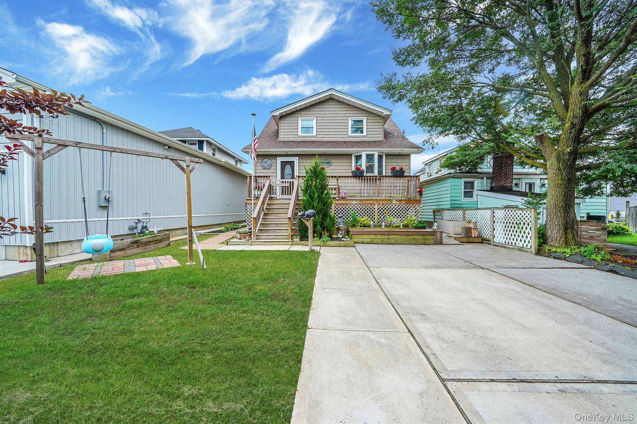 Discover this beautiful fully raised 3 bedroom, 2 bathroom home, offering stunning water front living in the Meadowmere section of Lawrence ; with modern comforts and rustic charm.