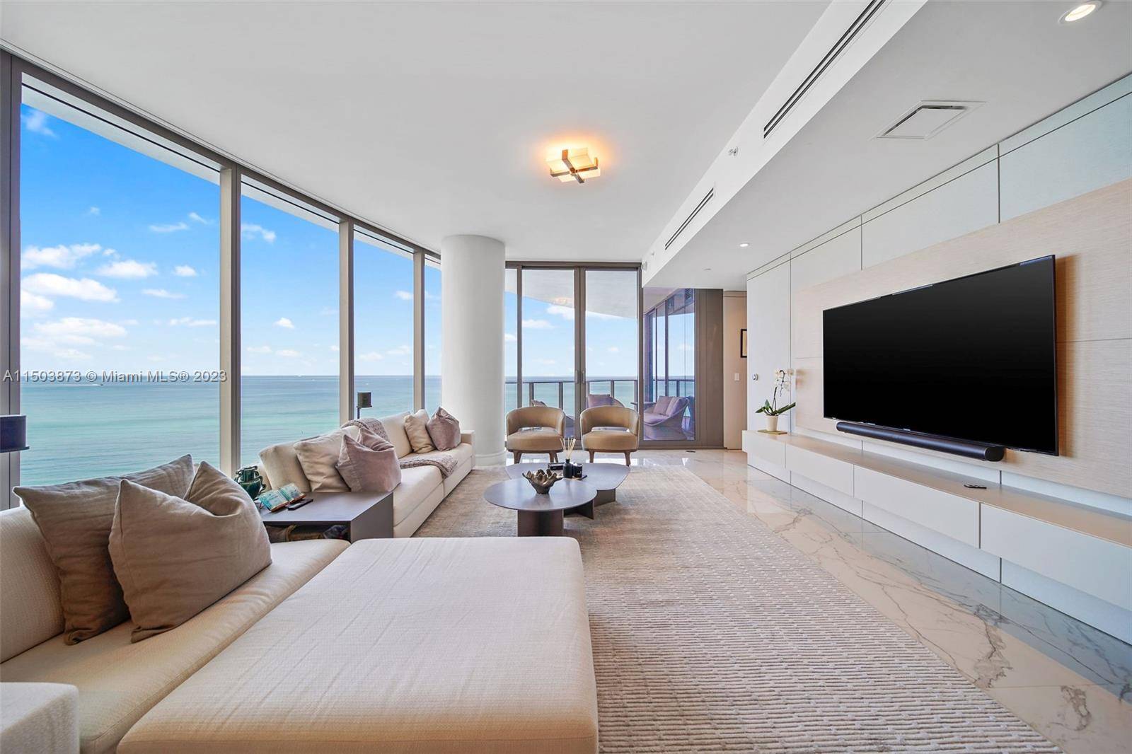 Welcome to the epitome of luxury living at The Ritz Carlton Sunny Isles, where this exquisite flow through 4 bed 4.