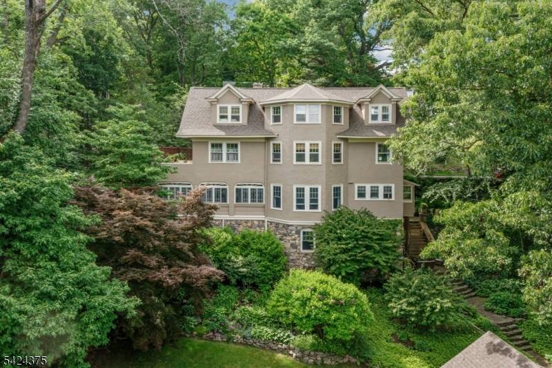 Resting on over half an acre of beautifully landscaped property, this meticulously maintained Hapgood Colonial offers timeless charm in one of the community's most desirable and convenient locations.