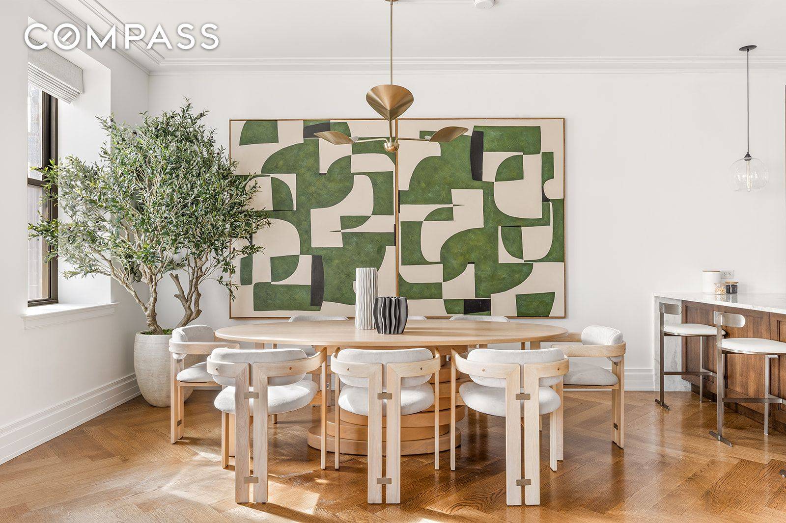 Welcome to Unit 705, a corner residence with a breathtaking, sun filled great room framed by a south facing bay window and a working wood burning fireplace.