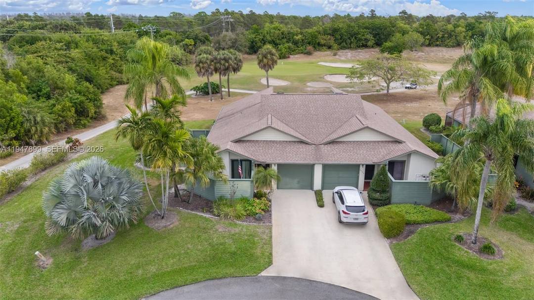 Discover resort style Florida living in this 2BR 2BA home with an enclosed Florida room, perfectly set along the lush fairways of the Heritage Ridge Golf Course in desirable Hobe ...