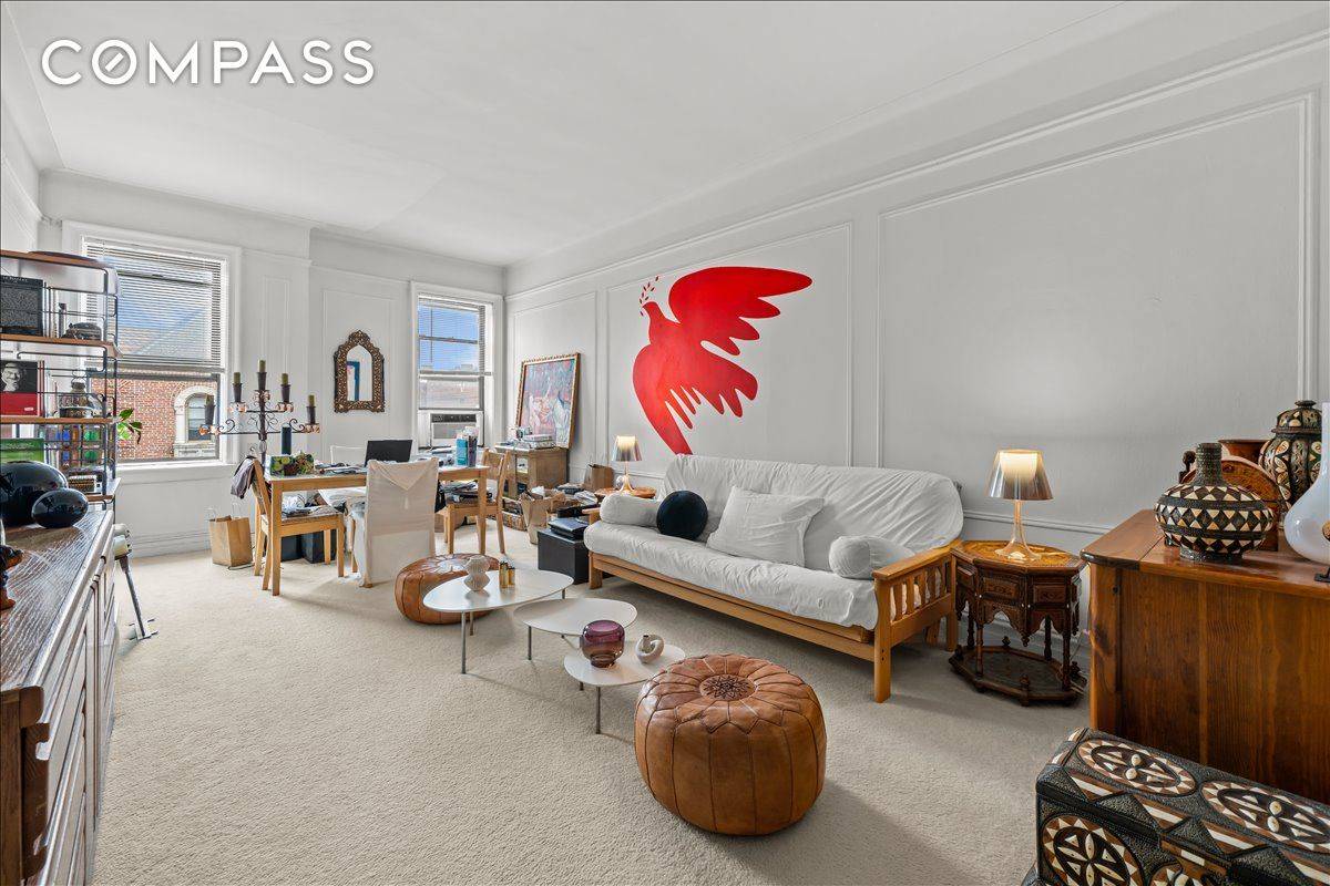 Welcome to Residence 6K at 38 10 35th Avenue, an elegant top floor one bedroom co op in the heart of Jackson Heights.
