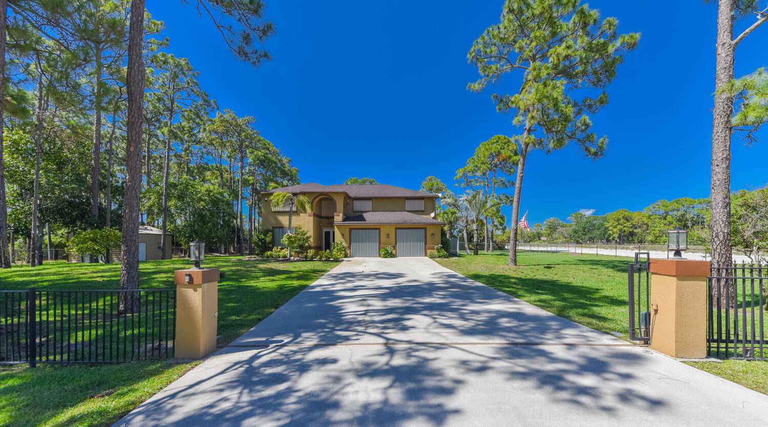 Beautifully maintained 4 br 3 bath 2 story house with pool on large lot 2 acres.