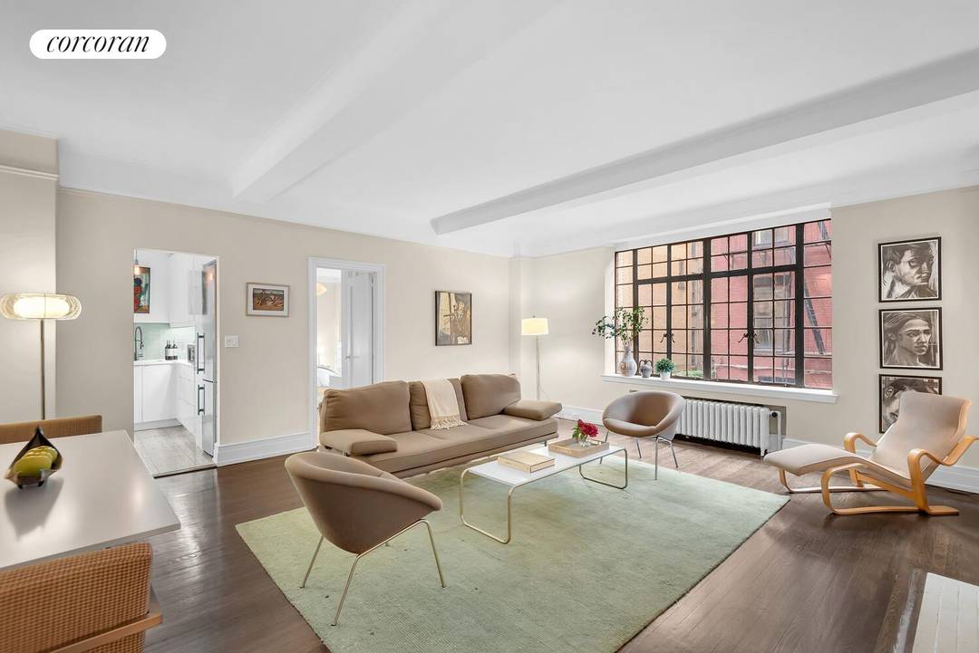 Charming townhouse views from Apartment 2C, a mint renovated supersized 1 bedroom gem approximately 900 sqft, the perfect blend of classic details and modern sophistication, so close to Central Park.
