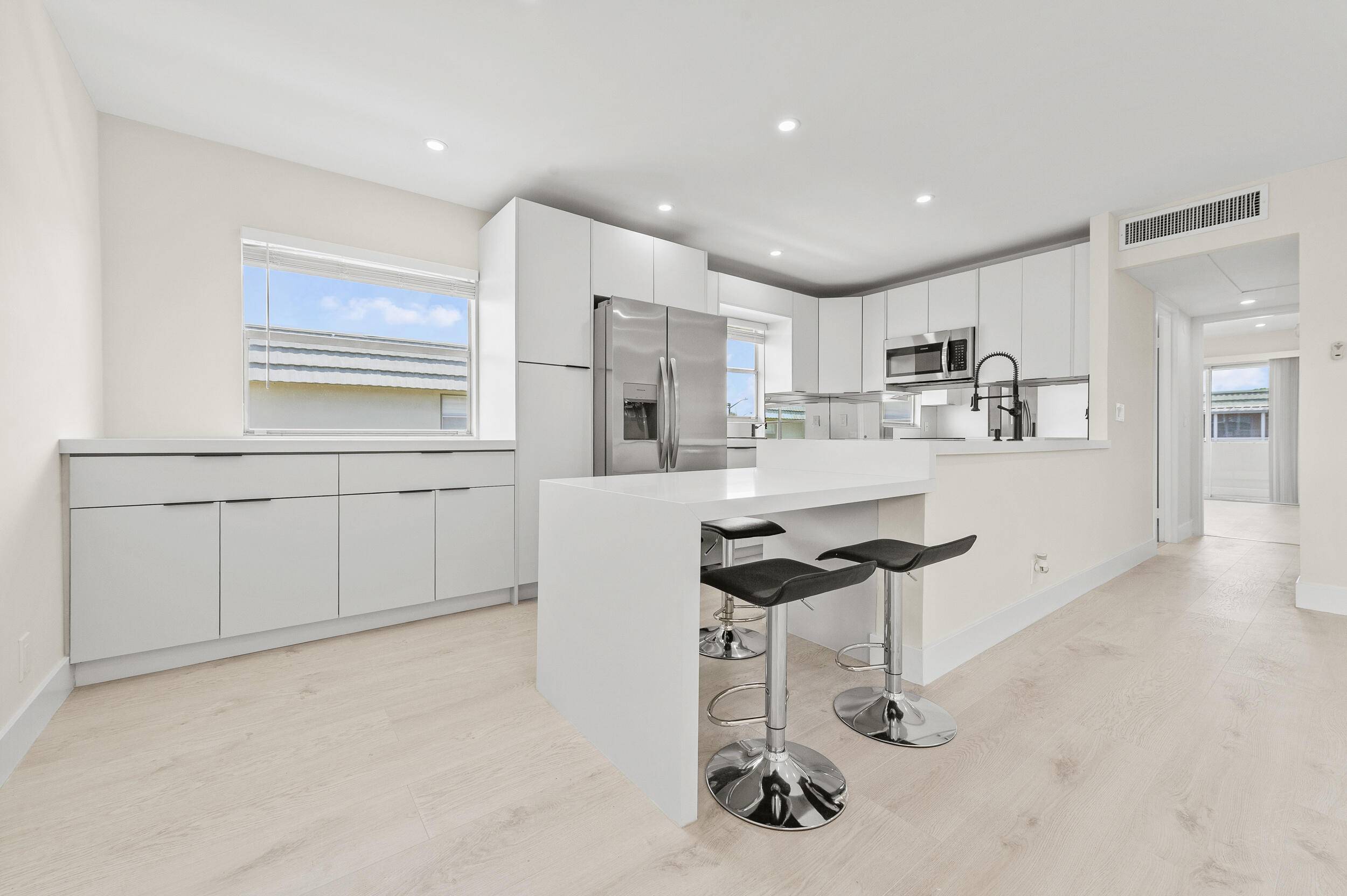 Stunning, Fully Renovated 2BR 2BA Condo with Designer Finishes Upscale Touches Throughout at the 55 Non equity membership King's Point Golf and Country Club !