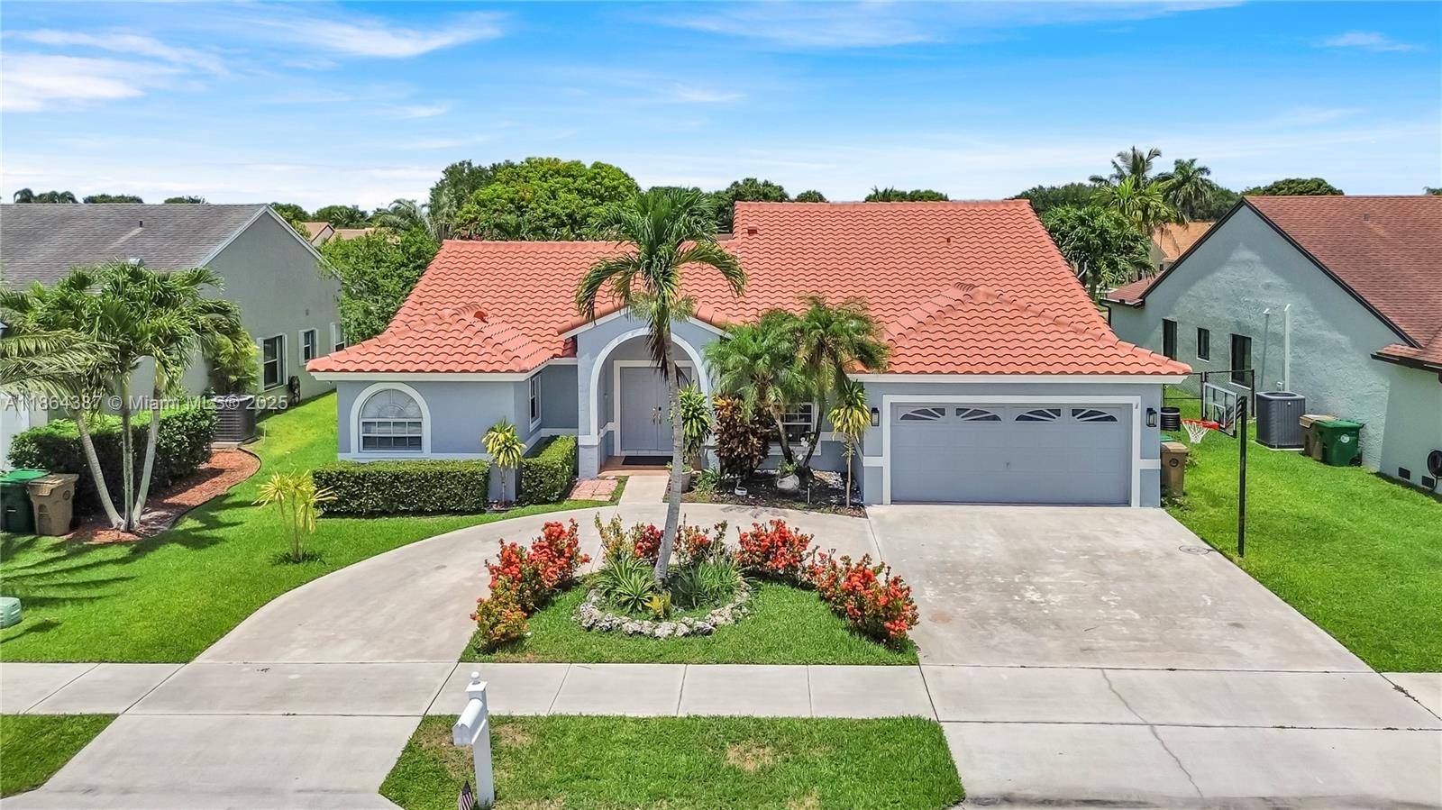 Located in the desirable community of Nob Hill Palms, this 5 bedroom, 2.