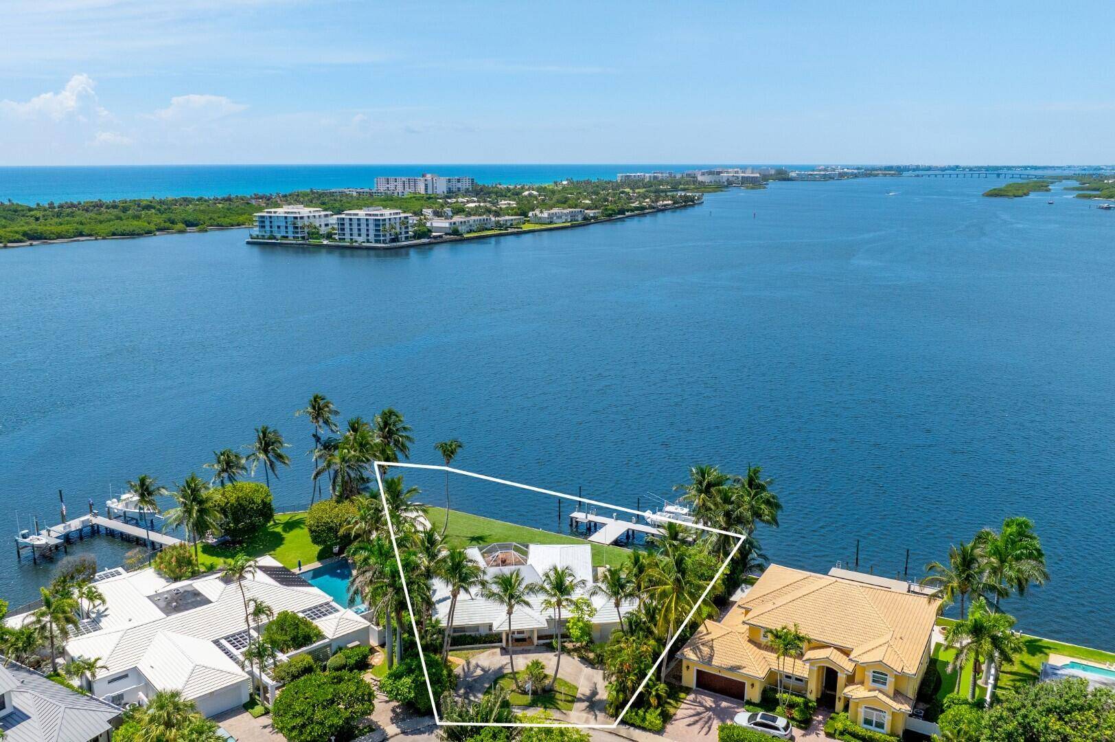 The Crown Jewel of SOSO Spectacular, one of a kind point lot in the highly desirable South of Southern neighborhood of West Palm Beach.