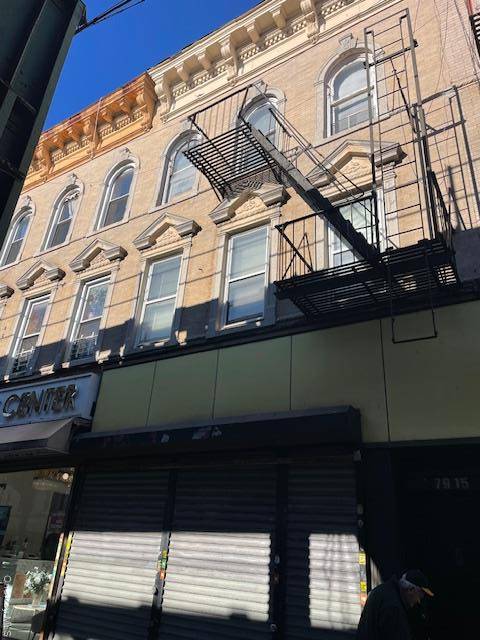 Great investment opportunity, over 1600 Sq Ft of commercial space on the first floor with full basement plus 2 large apartements on 2nd and 3rd floor.