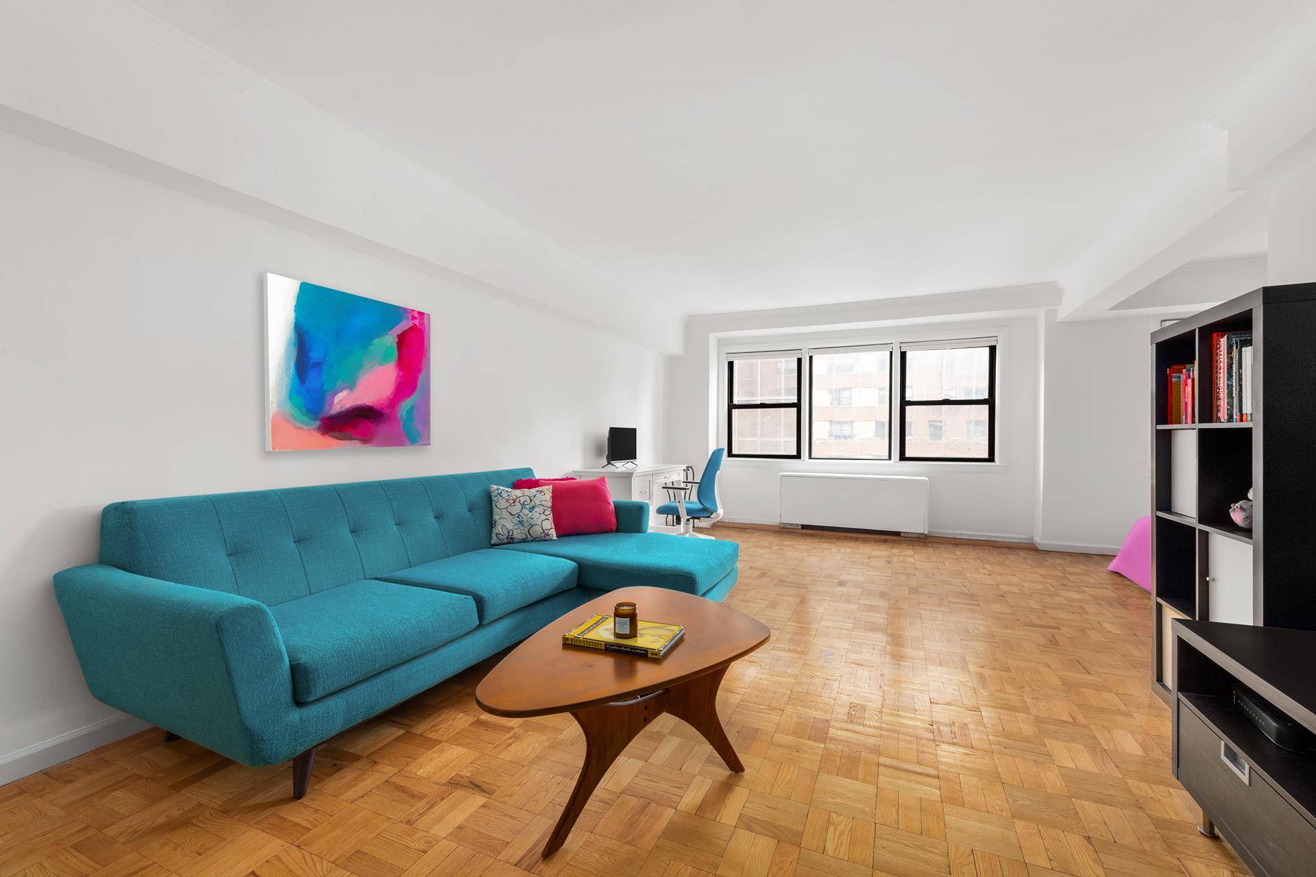 New to market ! Beautiful alcove studio easily convertible into a junior one bedroom which can accommodate a king or queen size bed with two nightstands.