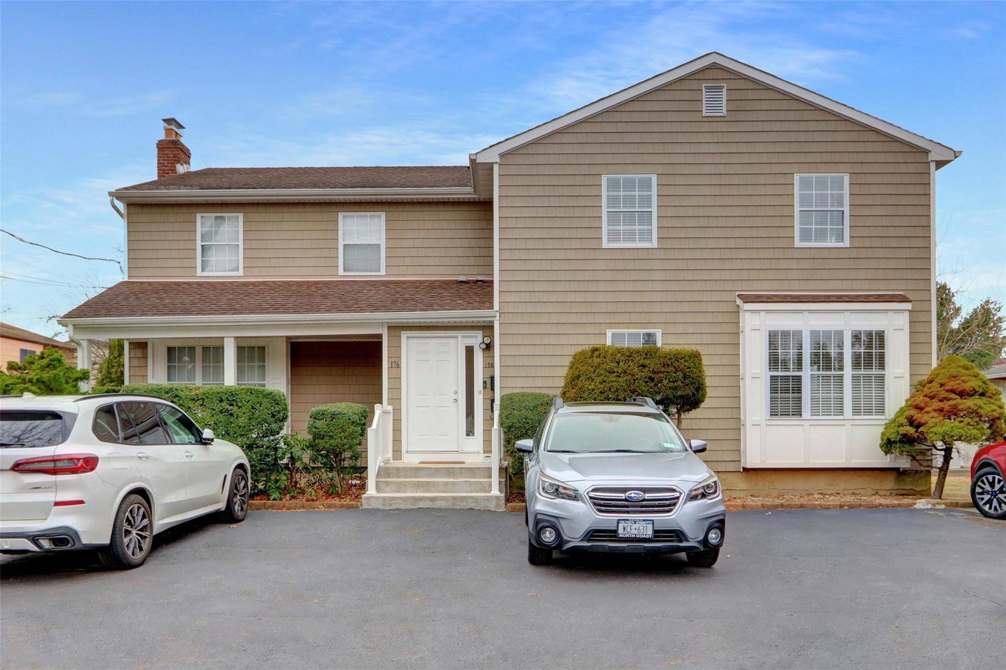 ATTACHED COLONIAL STYLE UNIT.