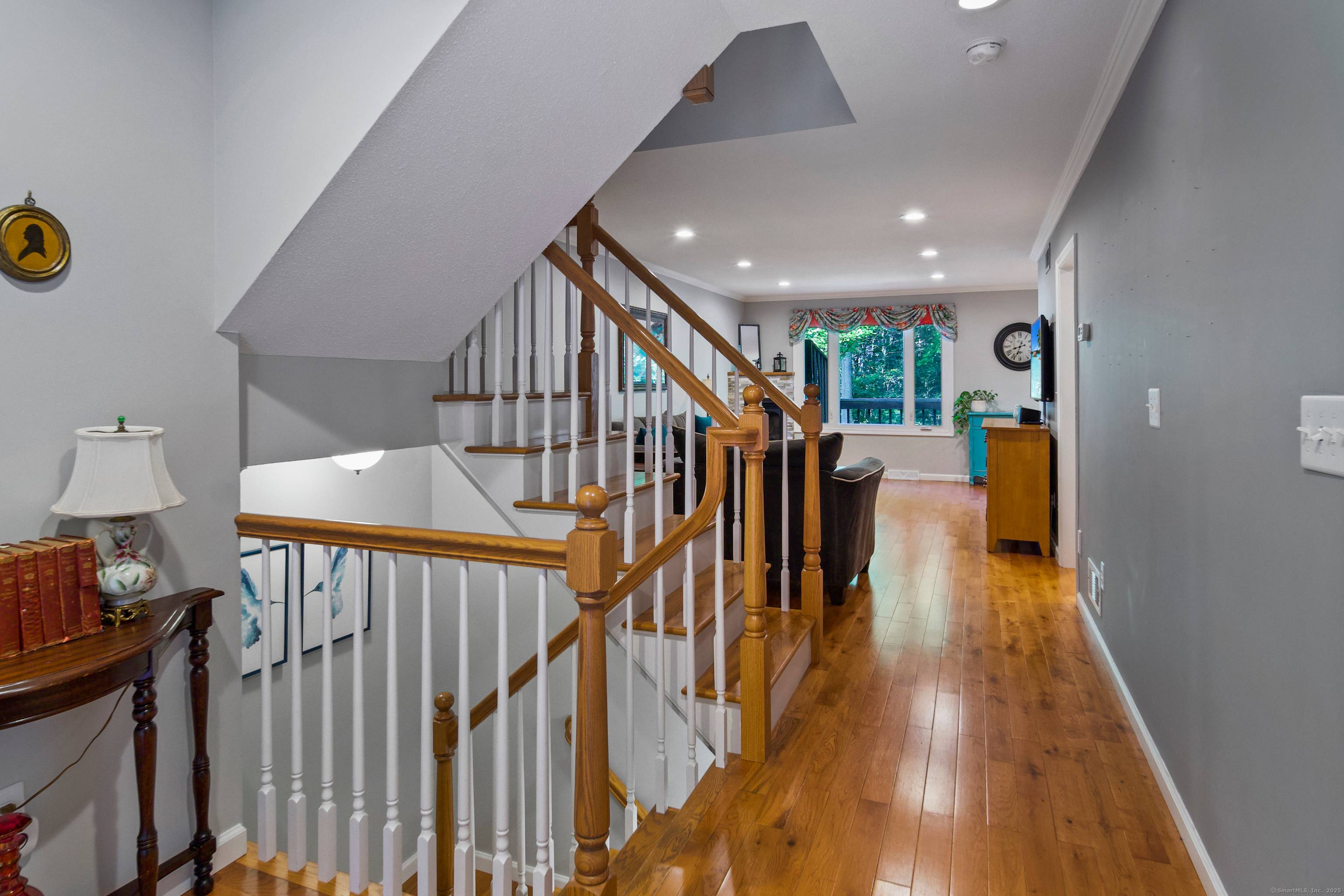 Welcome home to this rarely available end unit located in The Woods of Glastonbury, just minutes from downtown !