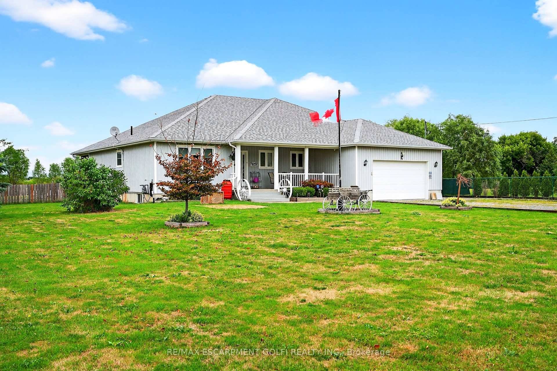 Custom built in 2012, this Campden bungalow blends quality construction with modern comfort on a 1 acre lot.