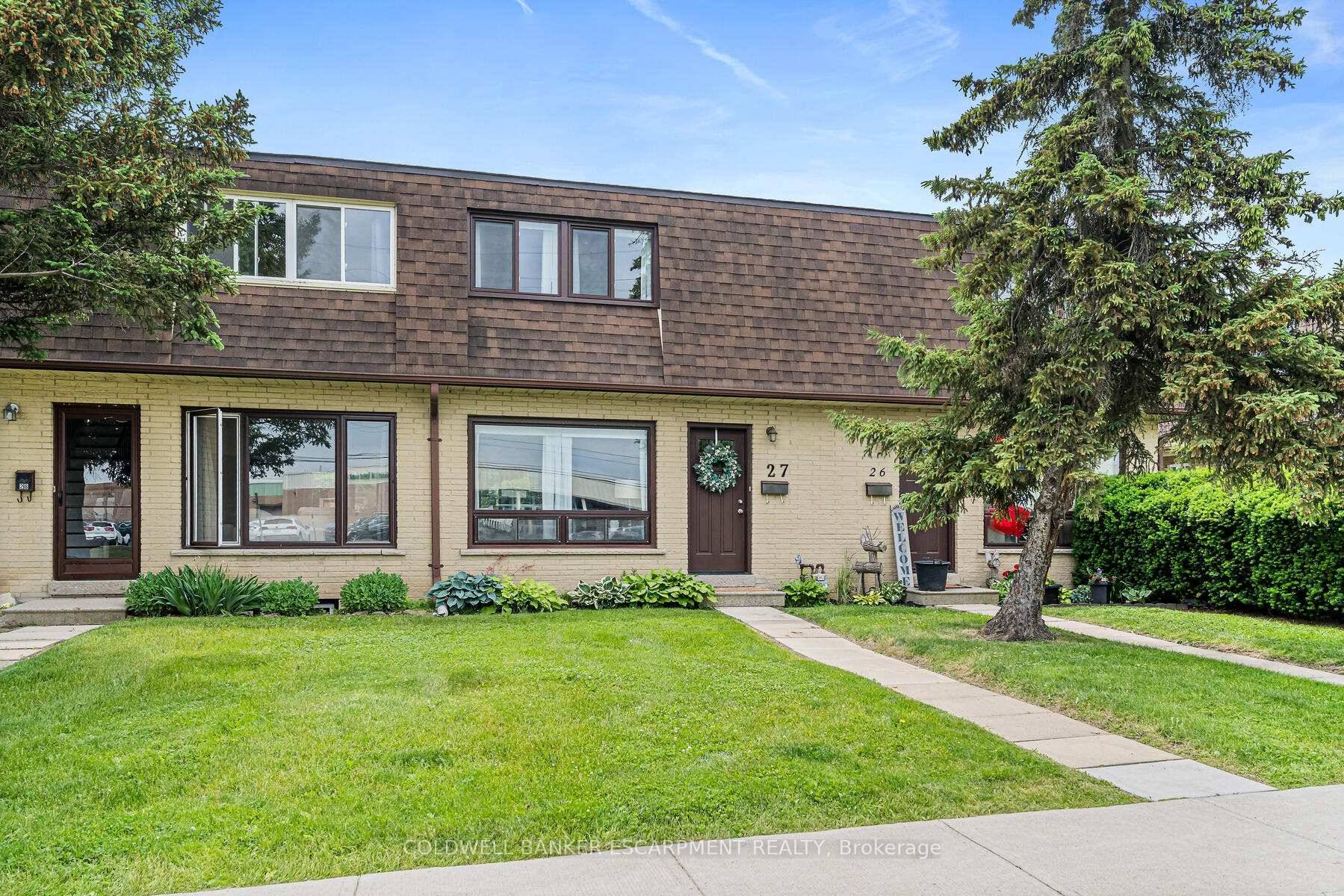 Welcome to this bright and inviting 3 bedroom, 2 bath condo townhouse, perfectly located within walking distance to restaurants, schools, the mall, parks, and scenic ravine.