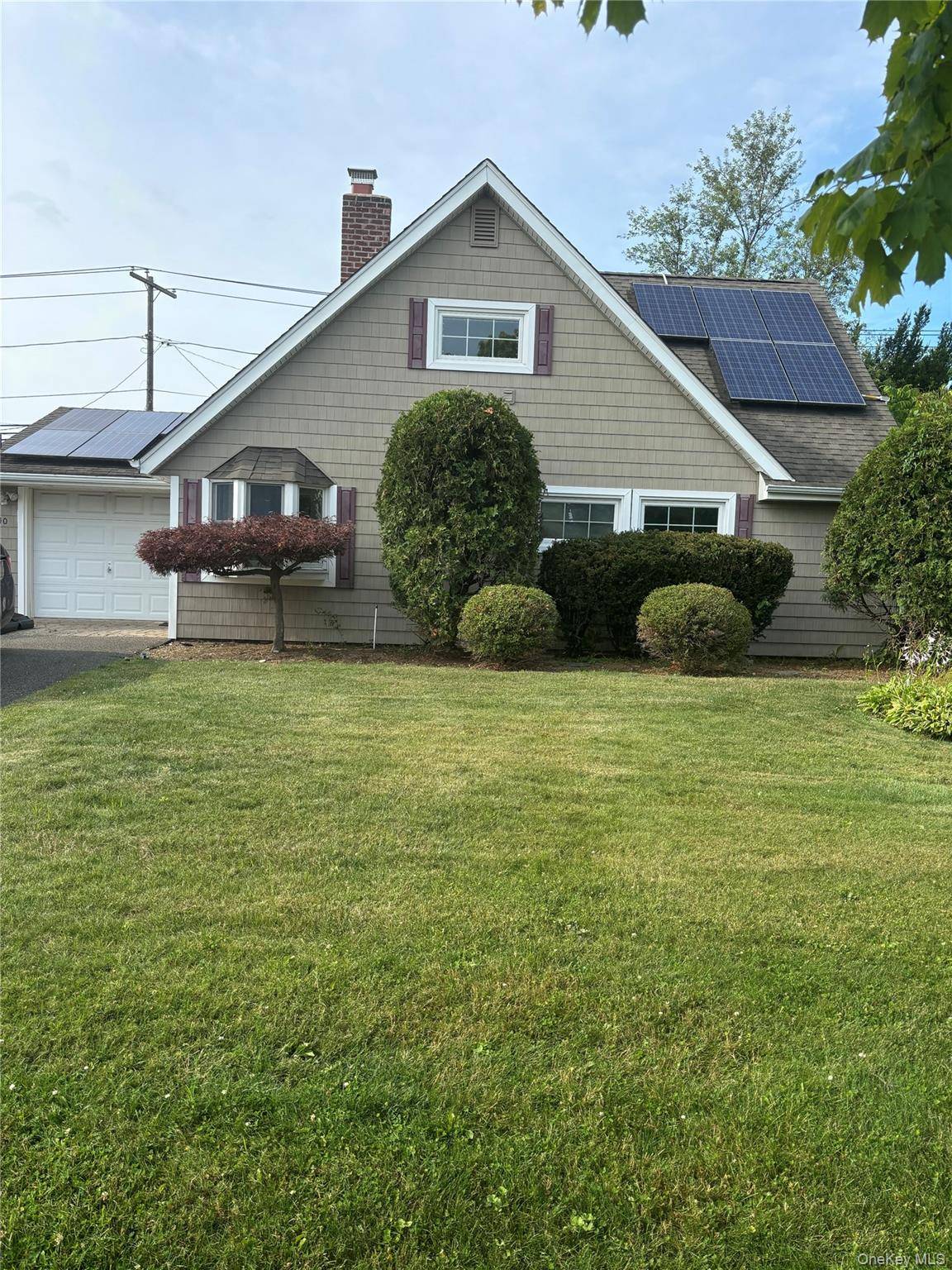 PERFECT MID BLOCK LOCATION IS THE SETTING FOR THIS UPDATED CAPE WITH NEW FLOORING THROUT FRESHLY PAINTED 2 PRIMARY BEDROOMS UPDATED 2 FULL BATHS NEW SS KITCHEN APPLIANCES UPDATED WINDOWS ...
