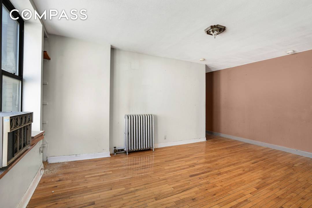 Top floor 3BR 1BA with big, open views over Adam Clayton Powell Blvd.