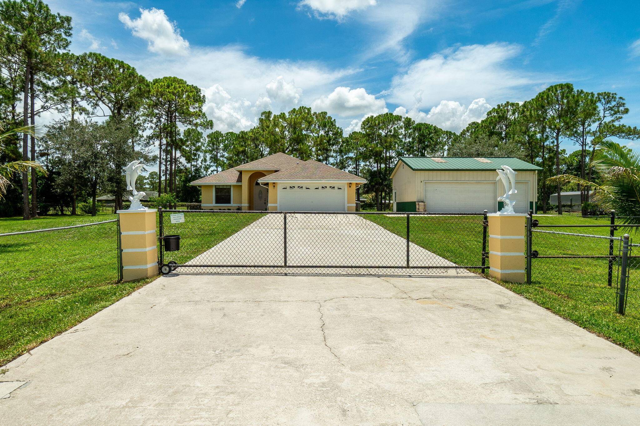 Welcome to this rare Loxahatchee gem This solid CBS Constructed Home features 2016 Roof A C, 2025 Hot Water Heater, Vaulted Ceilings, 3 bedrooms, 2 full baths, Large Kitchen w ...
