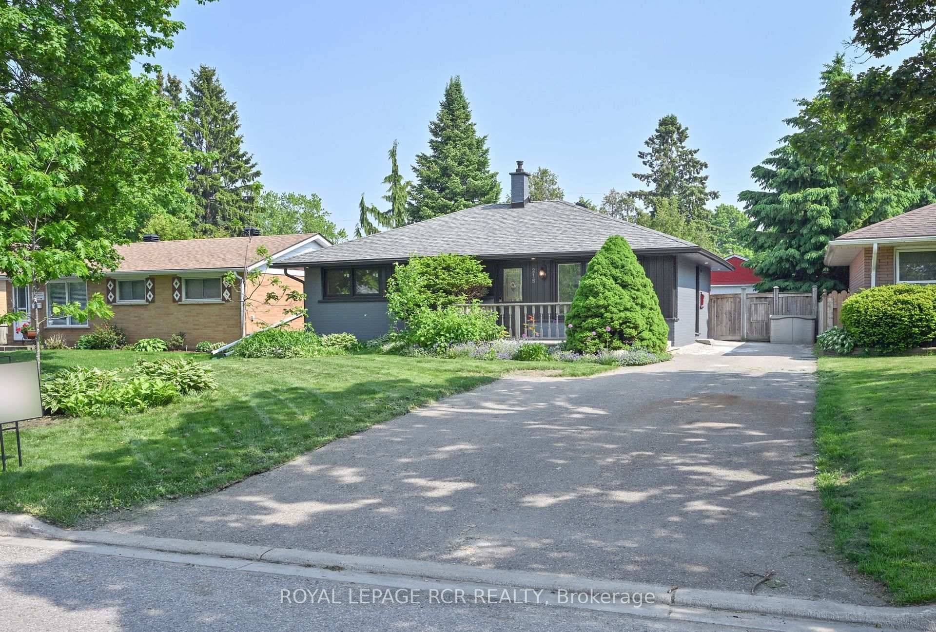 Welcome to 218 Elizabeth Street, Orangeville a beautifully renovated detached brick bungalow duplex nestled on a generous 50 ft x 142 ft mature lot.