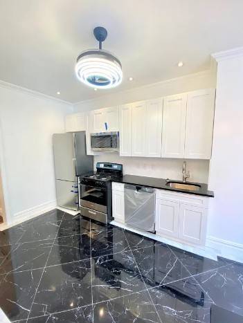 Rarely available, renovated rent stabilized prewar 3 bedroom, 3 bath apartment.
