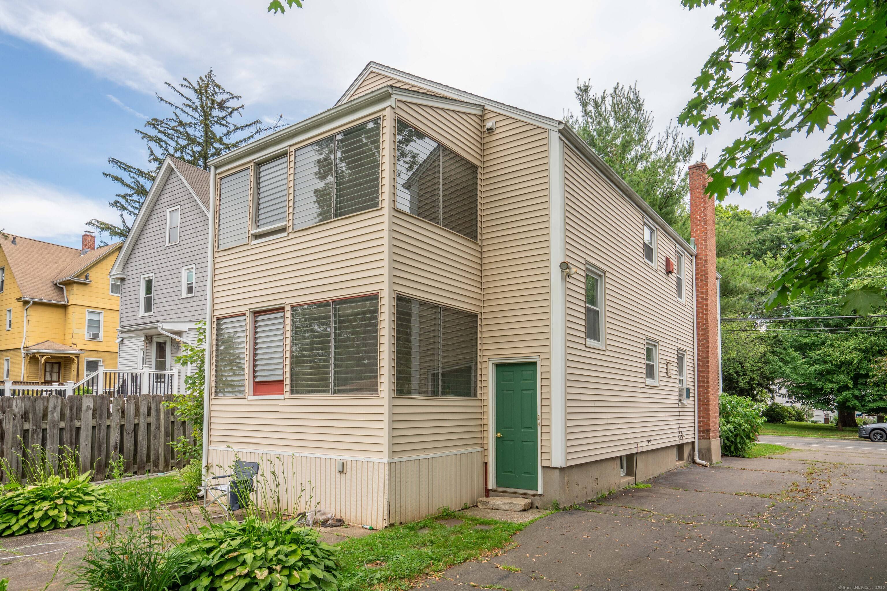 Well maintained two family home in a fantastic West Hartford location !