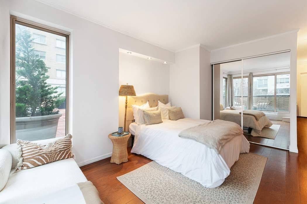 This elegant, renovated studio offers a rare blend of modern luxury and full service condominium living.
