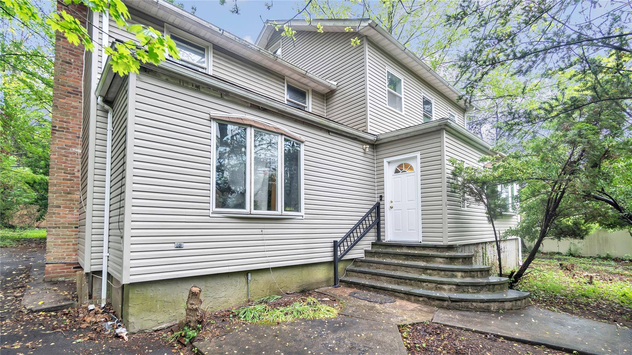 Tucked away for ultimate privacy and set far back from the street, this hidden gem is just.