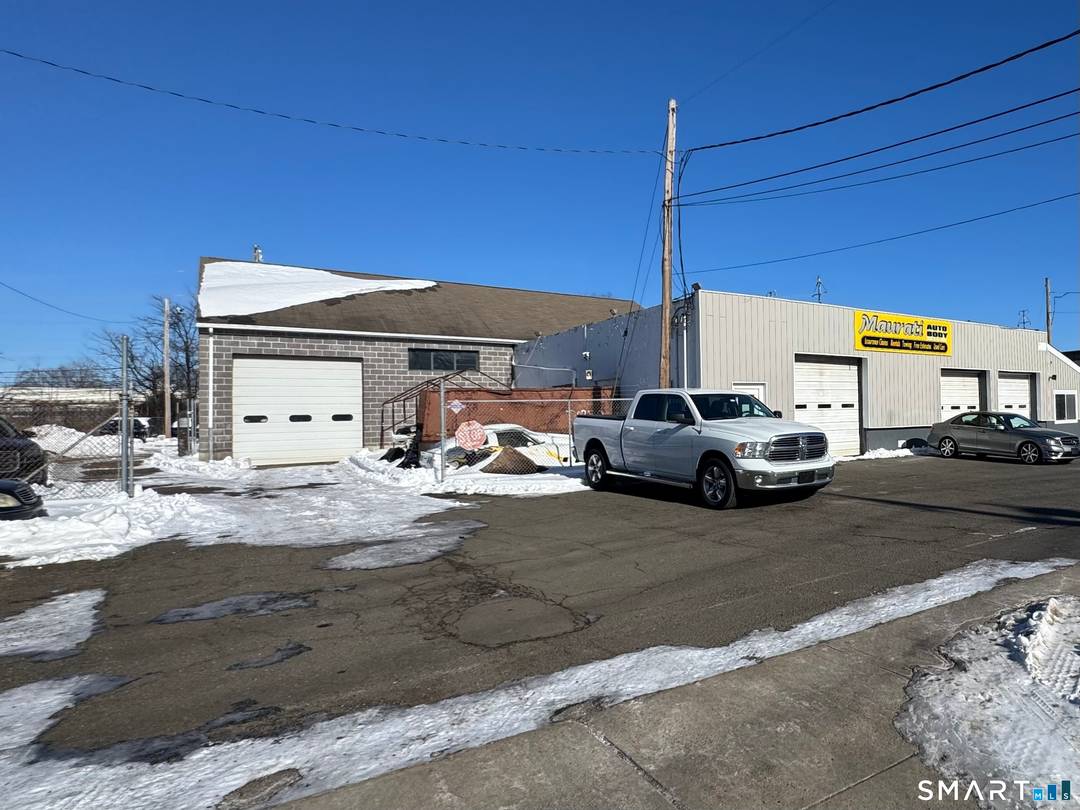 Thriving Body shop business comes with a dealers licence 200ft of frontage 082 acres.