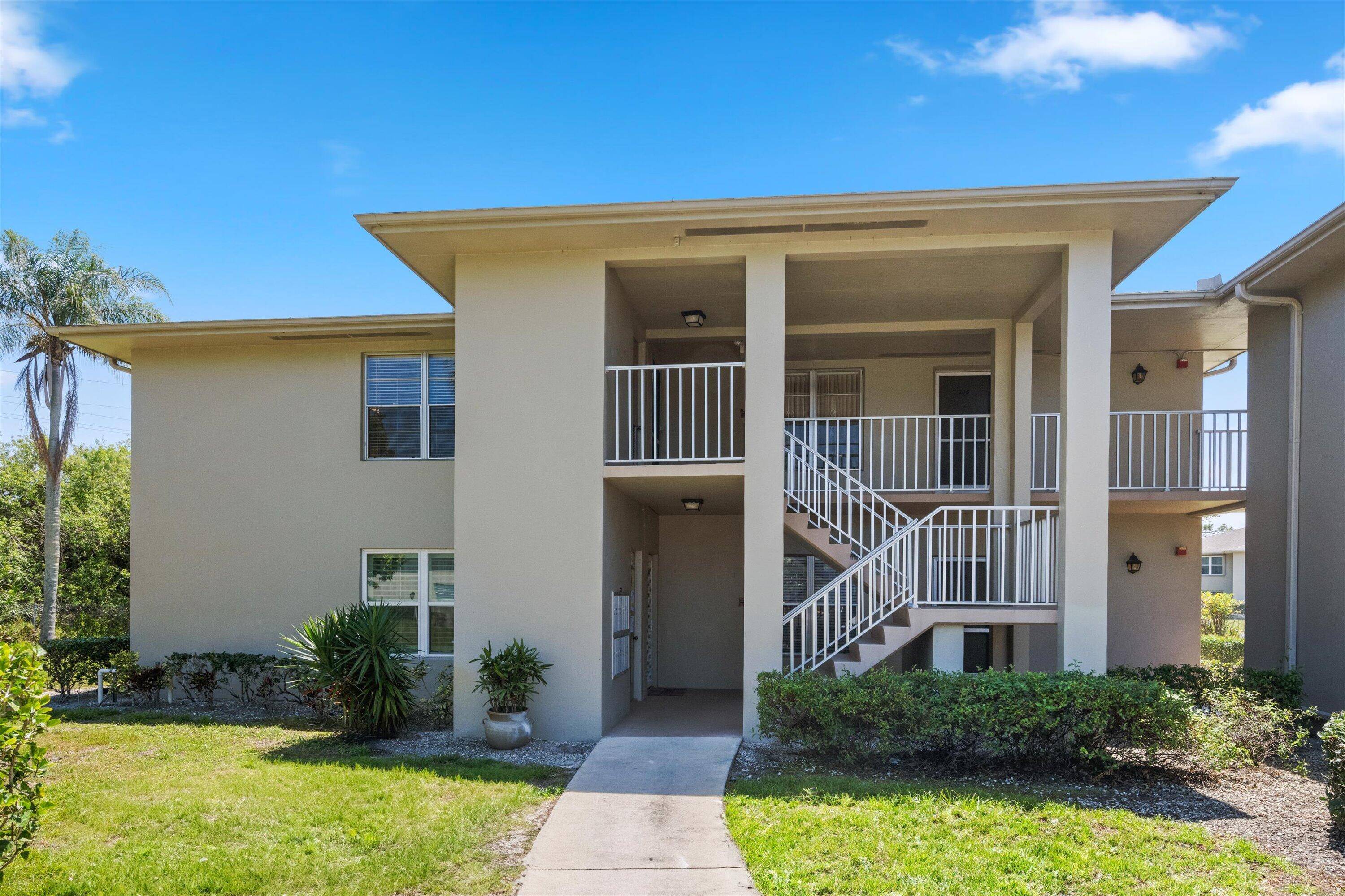 Welcome home to your second story, corner unit 2 bedroom, 2 bathroom condo in east Port Saint Lucie.