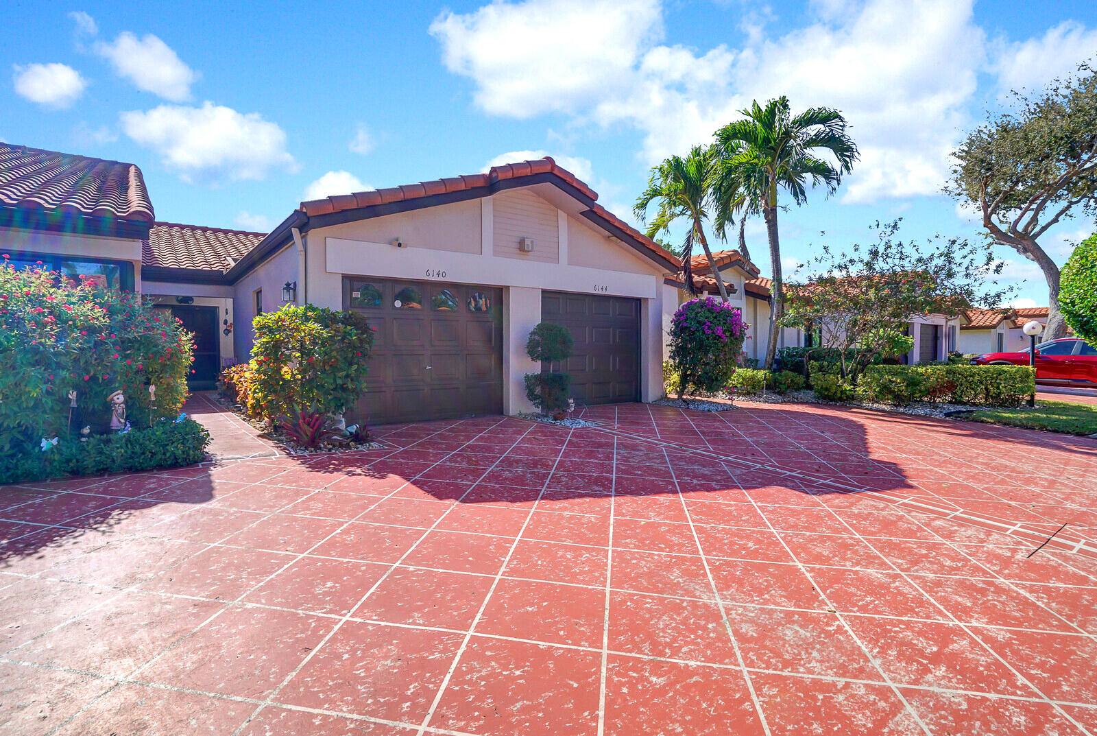 Move right into this unique one of a kind, custom renovated luxury villa in Huntington Pointe, a highly desirable active adult community in the heart of Delray Beach.