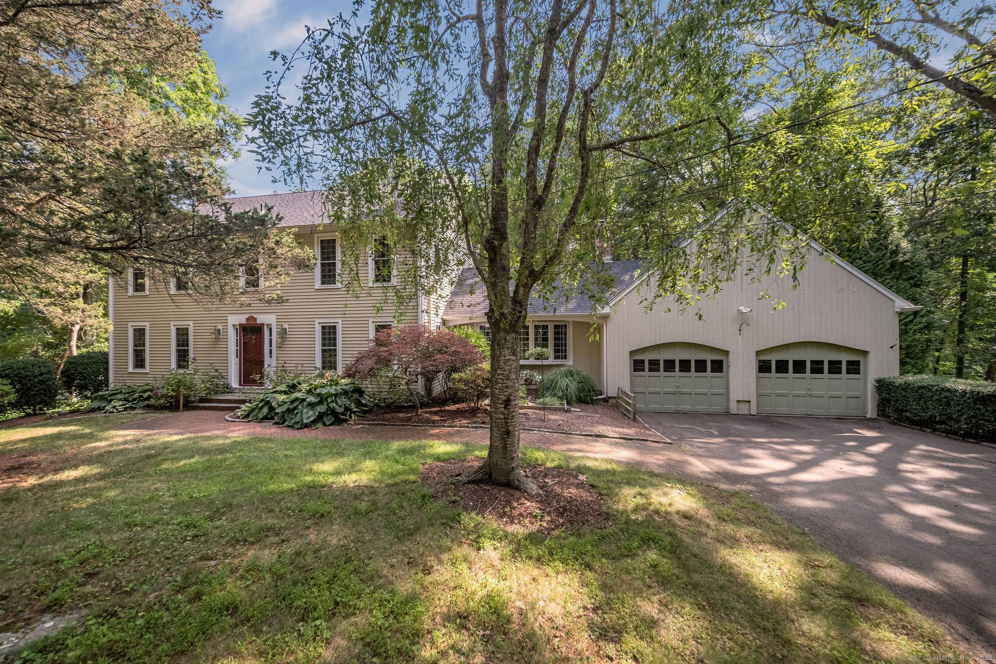 Welcome to this classic 5 bedroom Colonial on highly sought after Forest Hills Drive.