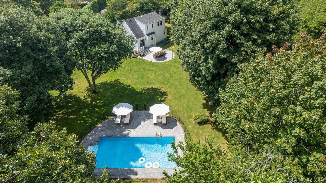 Discover the ultimate summer retreat, nestled south of Montauk Highway in Westhampton.