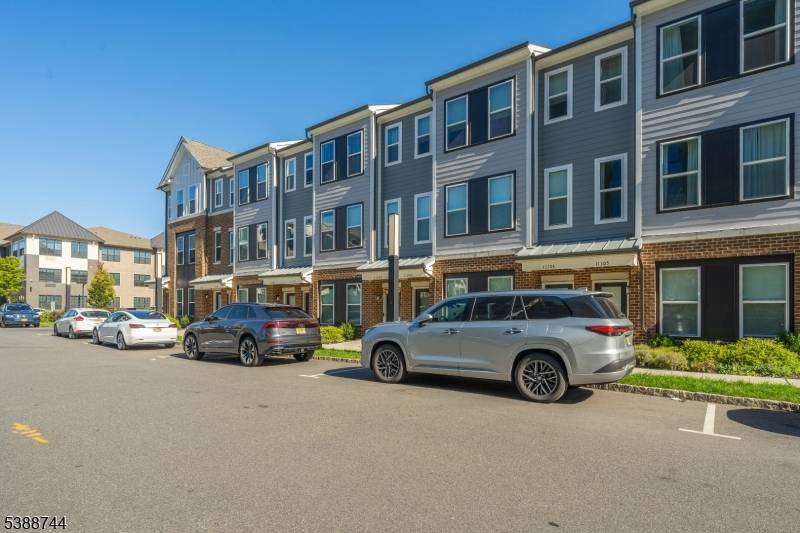 From top to bottom, this newly built unit has been thoughtfully upgraded with custom moldings, premium Benjamin Moore finishes, and hardwood floors throughout.