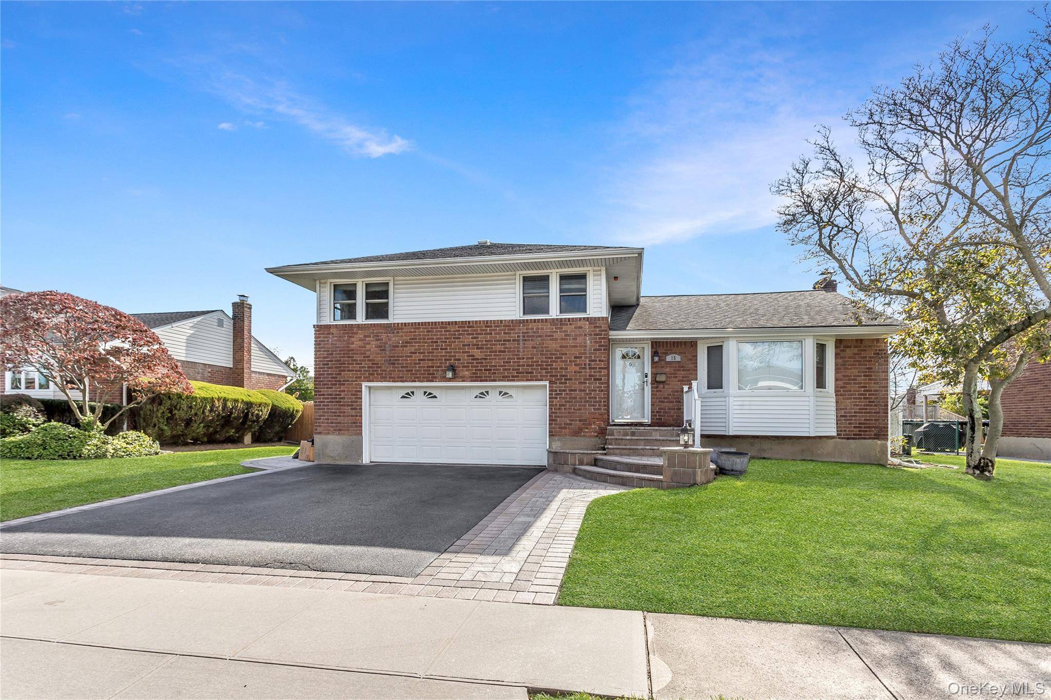 Move right into this bright and spacious split level home, which features 3 bedrooms, 3 updated full bathrooms, Central A C, large closets, plenty of storage.